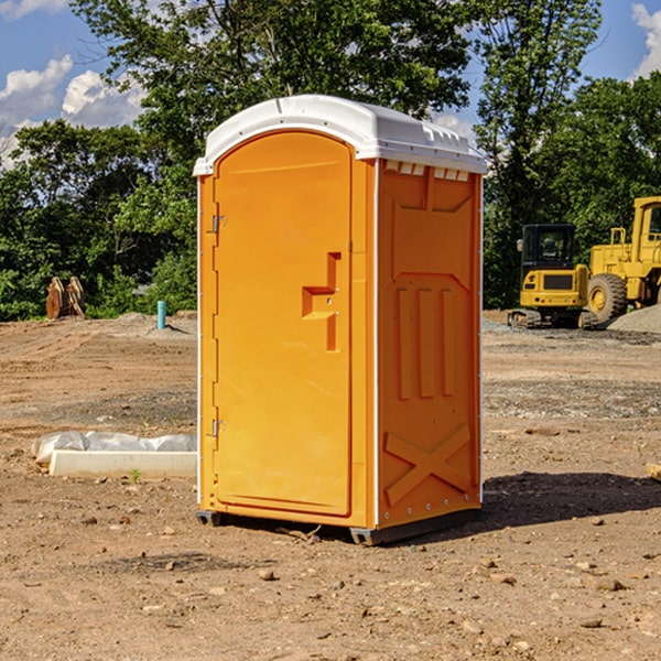 what is the cost difference between standard and deluxe portable restroom rentals in New Baden